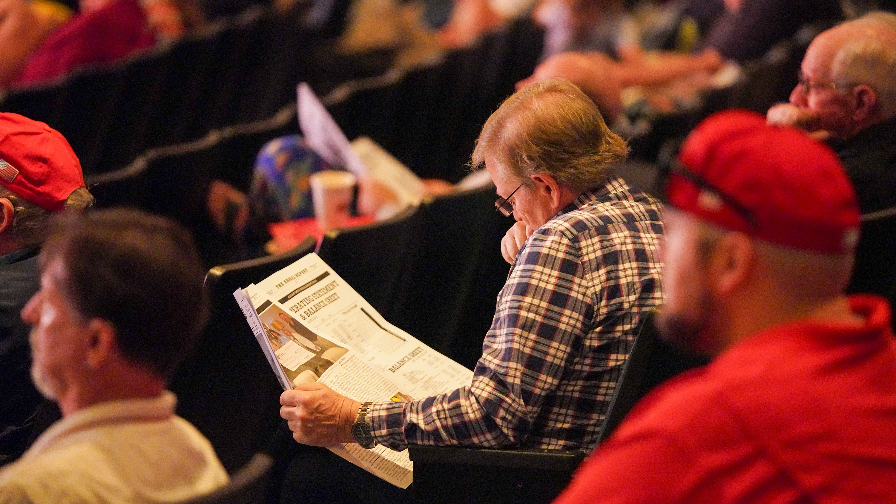 CHELCO Member reads 2023 Annual Report during the Business Meeting