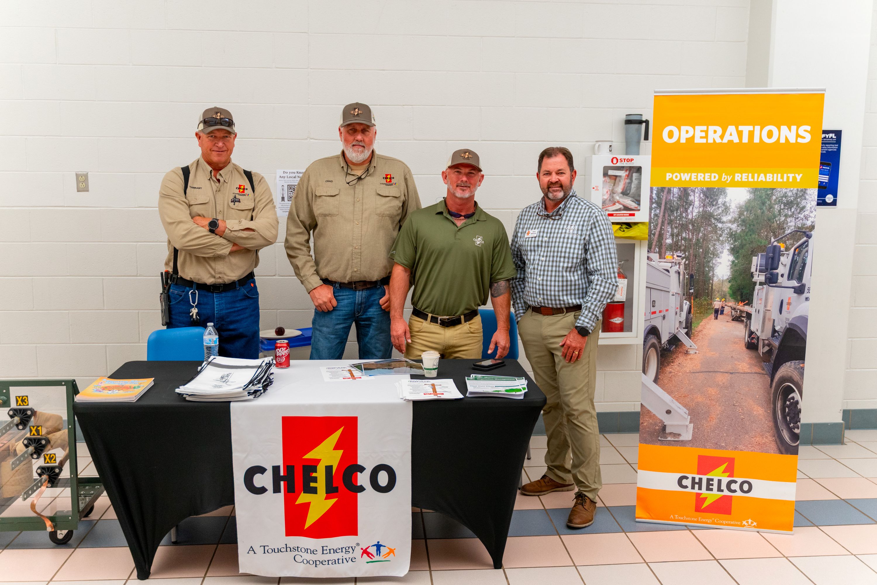 CHELCO Operations team members (L–R) Tarrant Bowles, Chad Holt, Jesse Nolin, and Kevin Wilkerson at the Annual Meeting Energy Expo.